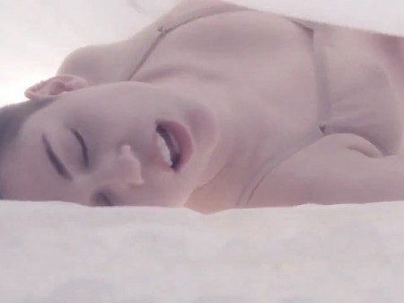 Miley_Cyrus_Rolls_Around_In_Lingerie_For_Her_Video_For_Adore_You_03_450x337.jpg
