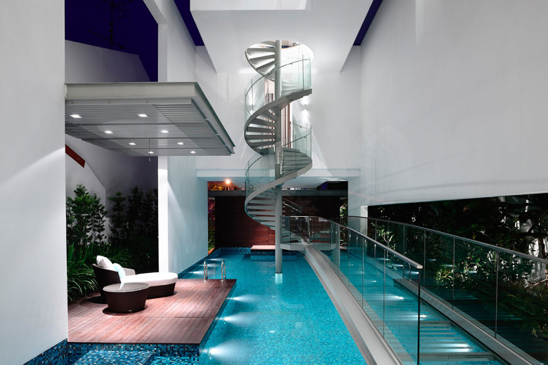 hyla_architects_designs_three_story_home_around_spiral_staircase_1.jpg