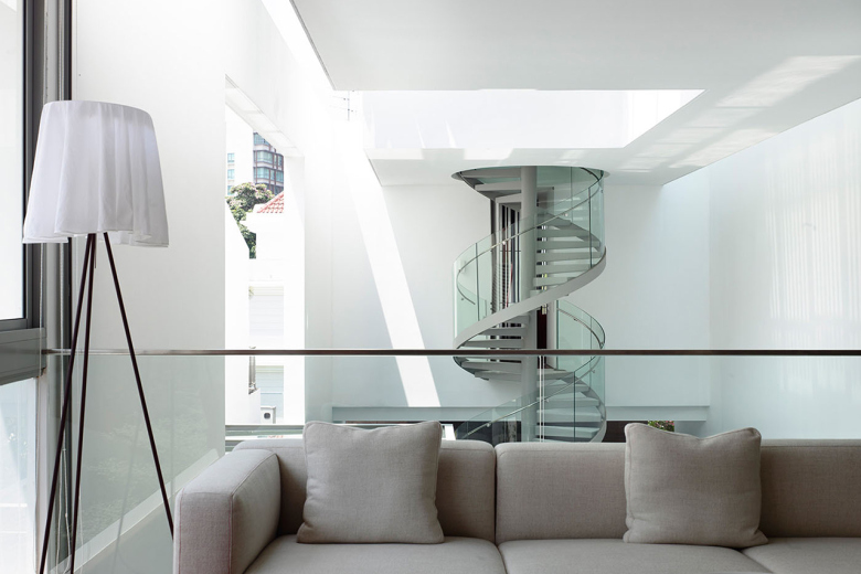 hyla_architects_designs_three_story_home_around_spiral_staircase_5.jpg