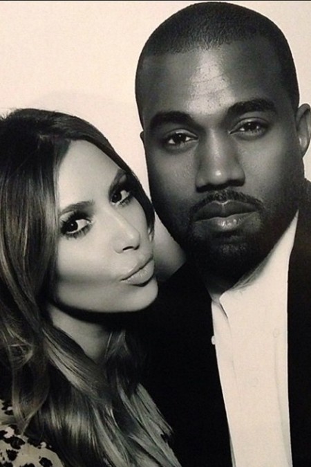 Kim_Kardashian_And_Kanye_West_Posts_Photos_From_The_Kardashian_Christmas_Party_To_Instagram_450x675.jpg