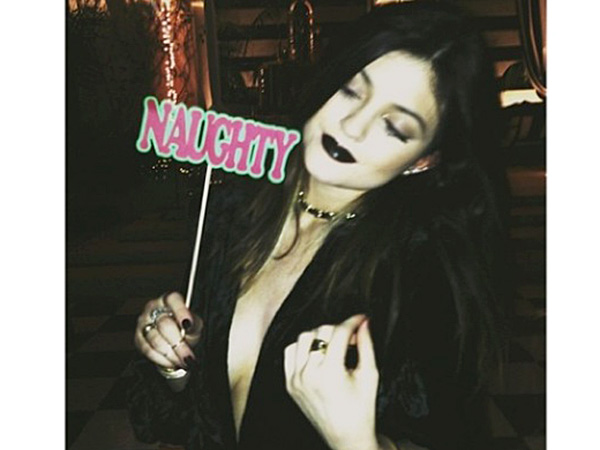 Kylie_Jenner_Posts_Naughty_Photo_From_The_Kardashian_Christmas_Party_To_Instagram_LB.jpg