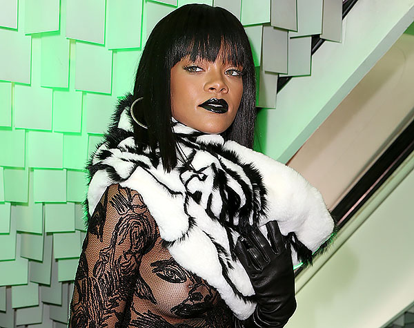 Rihanna_Flashes_Nipple_At_The_Jean_Paul_Gaultier_Fashion_Show_in_Paris_LB.jpg