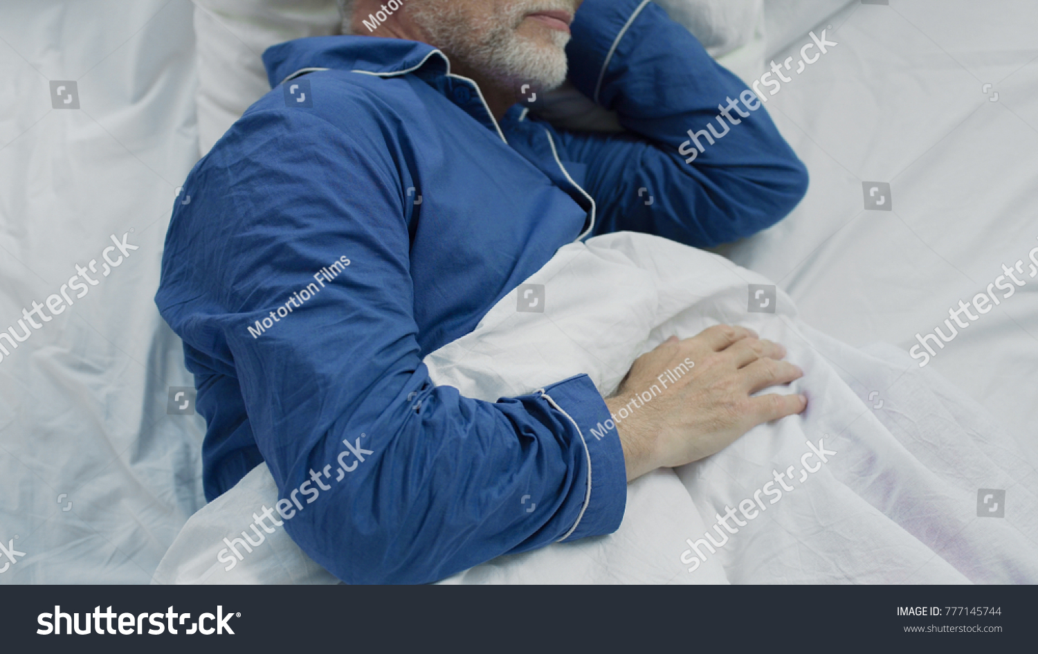 stock_photo_old_man_sleeping_in_bed_in_the_morning_recovery_time_and_healthy_sleep_777145744.jpg